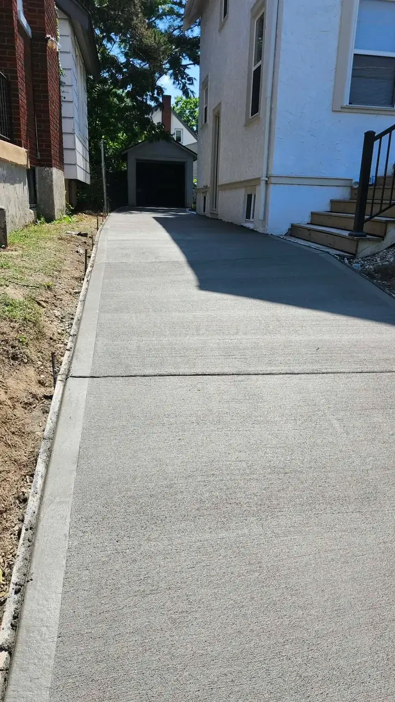 New concrete walkway poured alongside a Hamilton, OH home